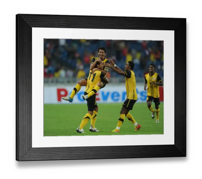 Framed Print : Mohamad Azmi Muslim Scores for Malaysia XI Against Arsenal in 2012