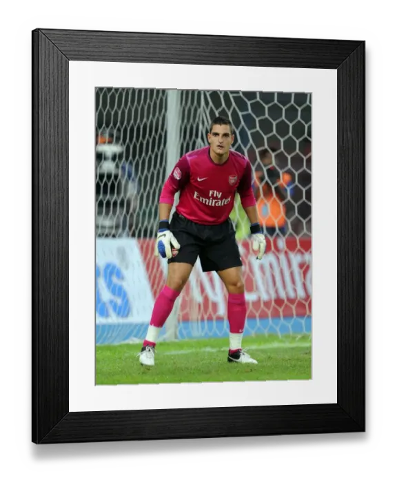 Framed Print : Vito Mannone: In Action for Arsenal Against Malaysia XI (2012)