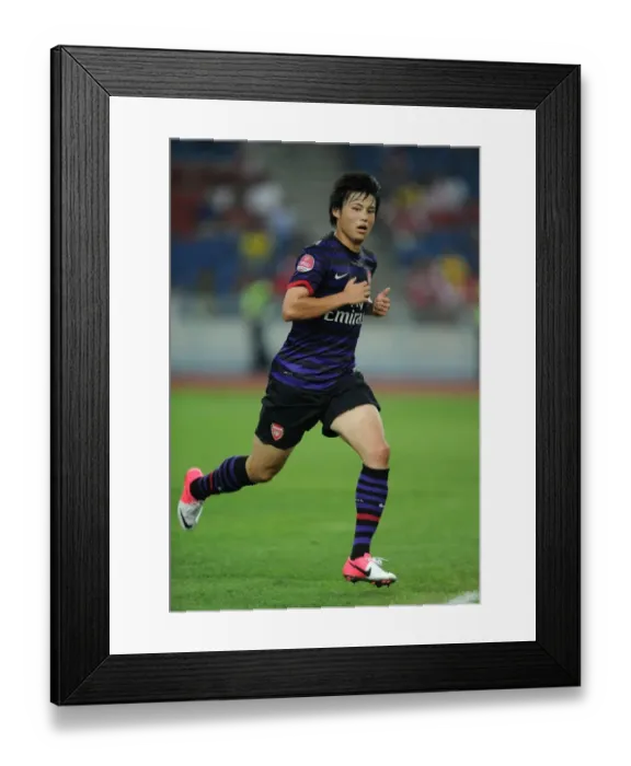 Framed Print : Ryo Miyaichi in Action: Arsenal vs Malaysia XI (2012) Framed Print : Ryo Miyaichi in Action: Arsenal vs Malaysia XI (2012)
