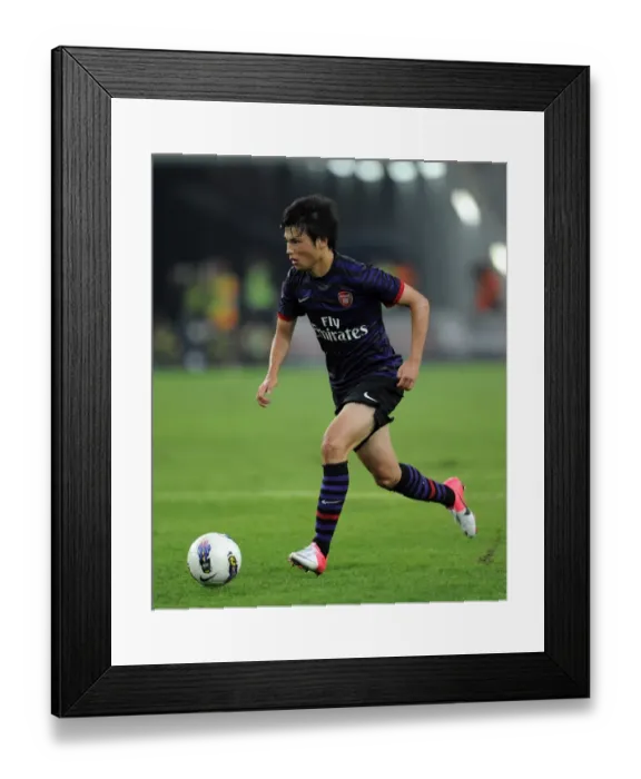 Framed Print : Ryo Miyaichi in Action: Arsenal vs Malaysia XI (2012) Framed Print : Ryo Miyaichi in Action: Arsenal vs Malaysia XI (2012)