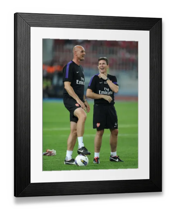 Framed Print : Arsenal Doctor Gary O Driscoll shares a joke with Steve Bould Arsenal Assistant Manager
