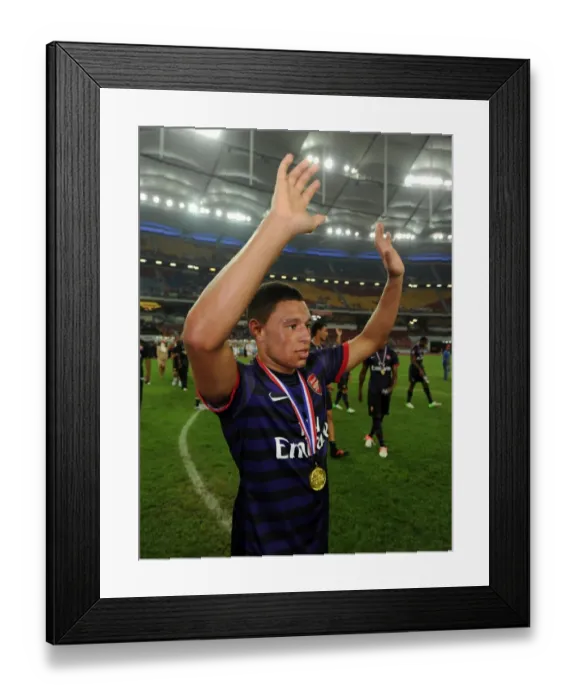 Framed Print : Alex Oxlade-Chamberlain (Arsenal). Malaysia 1: 2 Arsenal. Pre Season Friendly Framed Print : Alex Oxlade-Chamberlain (Arsenal). Malaysia 1: 2 Arsenal. Pre Season Friendly