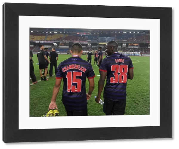 Alex Oxlade-Chamberlain and Benik Afobe (Arsenal). Malaysia 1: 2 Arsenal