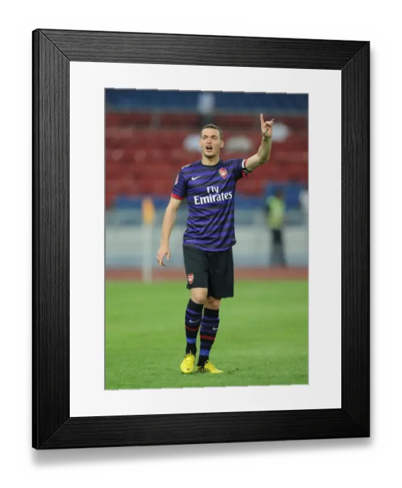 Framed Print : Thomas Vermaelen Leads Arsenal to Pre-Season Victory over Malaysia XI Framed Print : Thomas Vermaelen Leads Arsenal to Pre-Season Victory over Malaysia XI