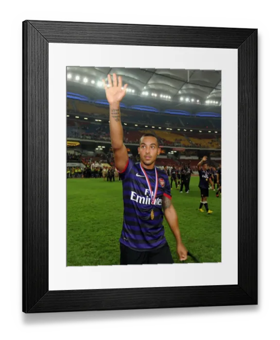 Framed Print : Theo Walcott Post-Match: Arsenal vs Malaysia XI (2012) Framed Print : Theo Walcott Post-Match: Arsenal vs Malaysia XI (2012)