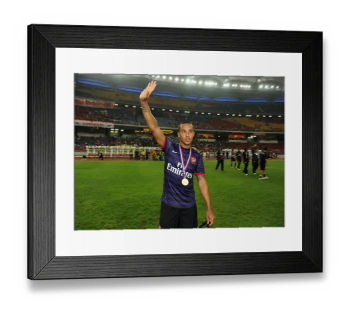 Framed Print : Theo Walcott (Arsenal). Malaysia 1: 2 Arsenal. Pre Season Friendly. National Stadium Framed Print : Theo Walcott (Arsenal). Malaysia 1: 2 Arsenal. Pre Season Friendly. National Stadium