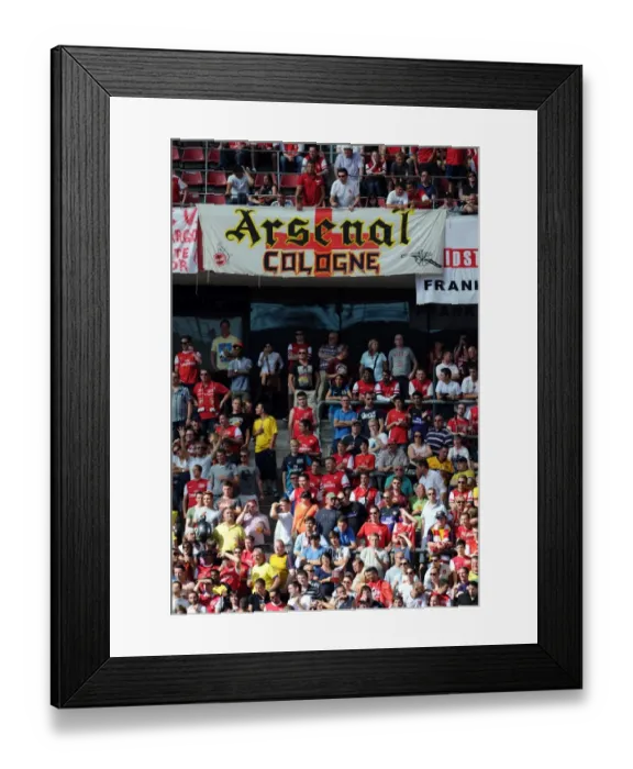 Framed Print : Arsenal Fans Celebrate 4-0 Pre-Season Victory over Cologne at Rhein Energie Stadium