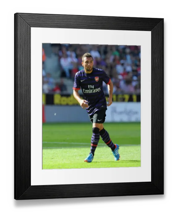 Framed Print : Santi Cazorla (Arsenal). Cologne 0: 4 Arsenal. Pre Season Friendly. Rhein Energie Stadium