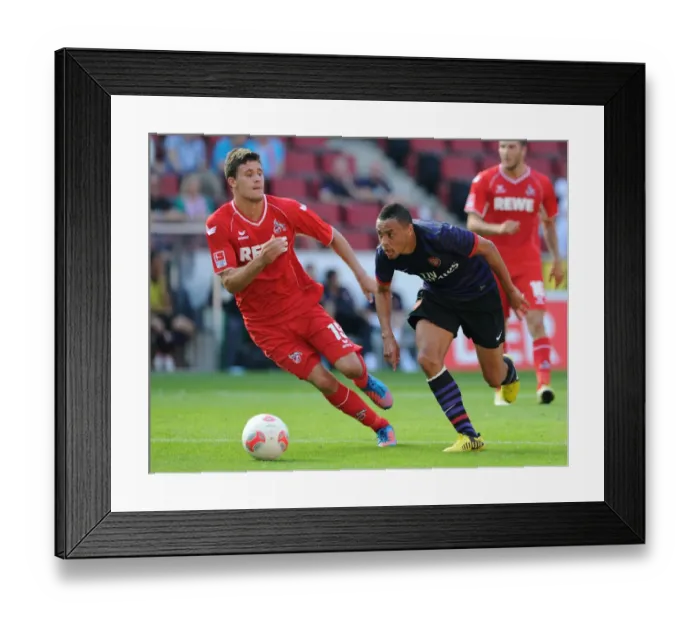 Framed Print : Arsenal's Coquelin Dominates Cologne: 4-0 Pre-Season Victory