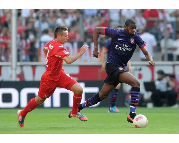 Abou Diaby (Arsenal) Adam Matuschyk (Cologne). Cologne 0: 4 Arsenal. Pre Season Friendly