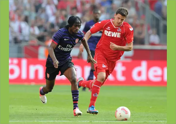 Gervinho (Arsenal) Tobias Strobl (Cologne). Cologne 0: 4 Arsenal. Pre Season Friendly