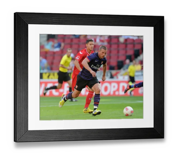 Framed Print : Lukas Podolski (Arsenal) Dino Bisanovic (Cologne). Cologne 0: 4 Arsenal