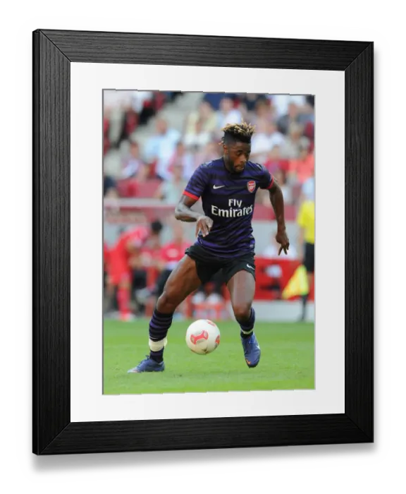 Framed Print : Alex Song (Arsenal). Cologne 0: 4 Arsenal. Pre Season Friendly. Rhein Energie Stadium Framed Print : Alex Song (Arsenal). Cologne 0: 4 Arsenal. Pre Season Friendly. Rhein Energie Stadium