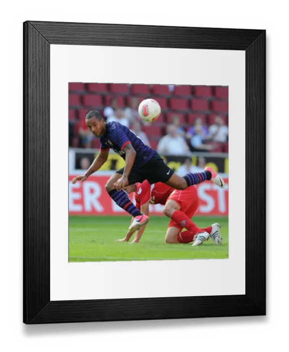 Framed Print : Theo Walcott (Arsenal). Cologne 0: 4 Arsenal. Pre Season Friendly. Rhein Energie Stadium Framed Print : Theo Walcott (Arsenal). Cologne 0: 4 Arsenal. Pre Season Friendly. Rhein Energie Stadium