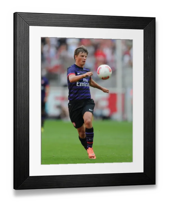 Framed Print : Arshavin in Action: Arsenal vs. FC Cologne (2012) Framed Print : Arshavin in Action: Arsenal vs. FC Cologne (2012)