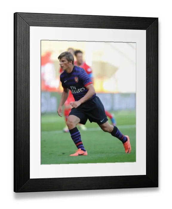 Framed Print : Arshavin in Action: Arsenal vs. FC Cologne (2012) Framed Print : Arshavin in Action: Arsenal vs. FC Cologne (2012)