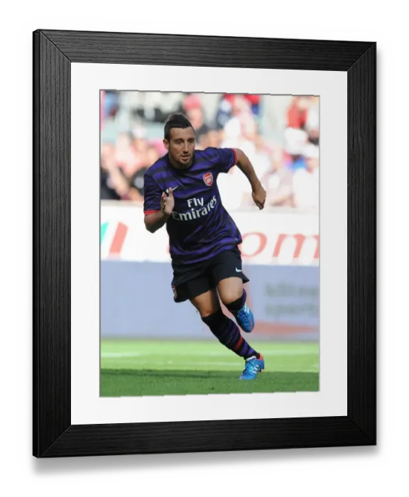 Framed Print : Santi Cazorla: In Action for Arsenal Against FC Cologne (2012) Framed Print : Santi Cazorla: In Action for Arsenal Against FC Cologne (2012)