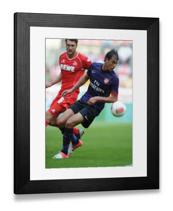 Framed Print : Marouane Chamakh in Action: Arsenal vs. FC Cologne Pre-Season Friendly, 2012