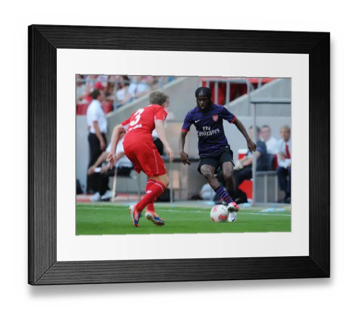Framed Print : Gervinho vs. Kubler: Arsenal's Pre-Season Clash with FC Cologne (2012) Framed Print : Gervinho vs. Kubler: Arsenal's Pre-Season Clash with FC Cologne (2012)