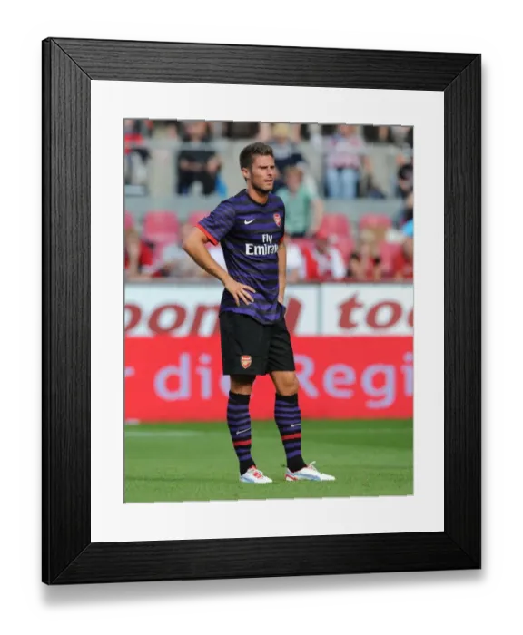 Framed Print : Olivier Giroud in Action: Arsenal vs. FC Cologne Pre-Season Friendly, 2012 Framed Print : Olivier Giroud in Action: Arsenal vs. FC Cologne Pre-Season Friendly, 2012