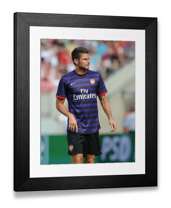 Framed Print : Arsenal's Olivier Giroud Faces Off Against FC Cologne in 2012 Pre-Season Friendly