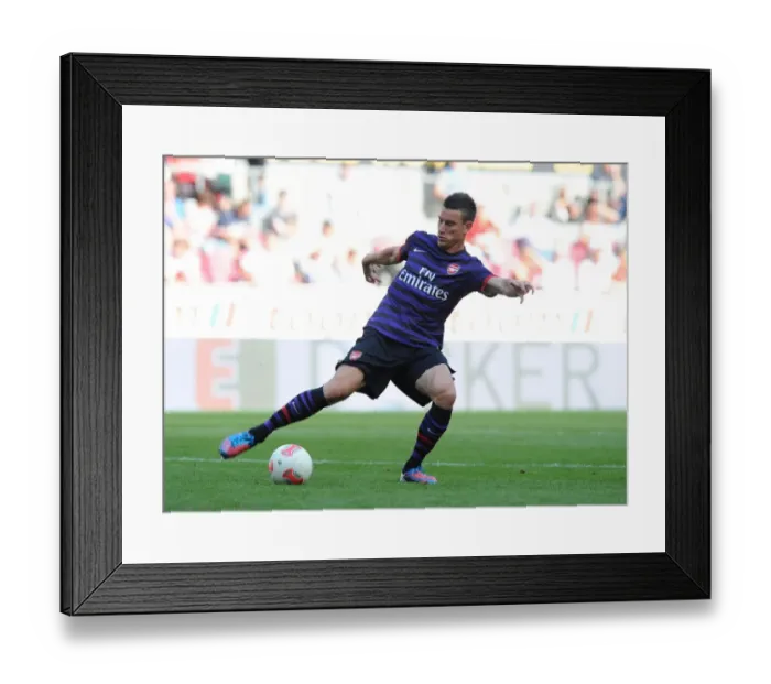 Framed Print : Laurent Koscielny in Action: Arsenal vs. FC Cologne Pre-Season Friendly (2012) Framed Print : Laurent Koscielny in Action: Arsenal vs. FC Cologne Pre-Season Friendly (2012)
