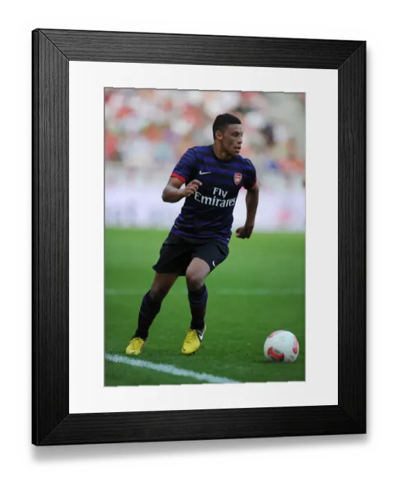 Framed Print : Arsenal's Alex Oxlade-Chamberlain Goes Head-to-Head with FC Cologne in 2012 Pre-Season Clash Framed Print : Arsenal's Alex Oxlade-Chamberlain Goes Head-to-Head with FC Cologne in 2012 Pre-Season Clash