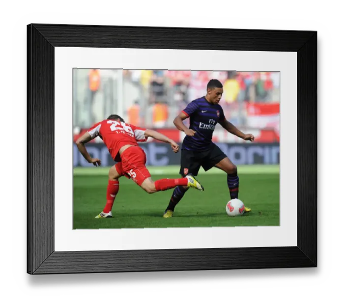 Framed Print : Clash of Talents: Oxlade-Chamberlain vs. Royer in Cologne Pre-Season Friendly Framed Print : Clash of Talents: Oxlade-Chamberlain vs. Royer in Cologne Pre-Season Friendly