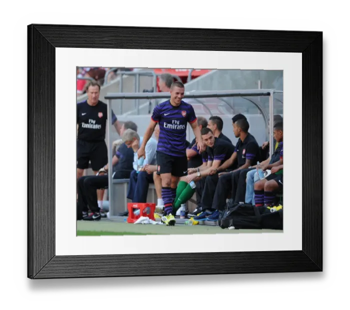 Framed Print : Lukas Podolski Shares a Joke with Arsenal Bench During Cologne Friendly, 2012 Framed Print : Lukas Podolski Shares a Joke with Arsenal Bench During Cologne Friendly, 2012