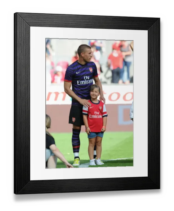 Framed Print : Lukas Podolski: Arsenal Star's Pre-Season Return to Cologne Framed Print : Lukas Podolski: Arsenal Star's Pre-Season Return to Cologne