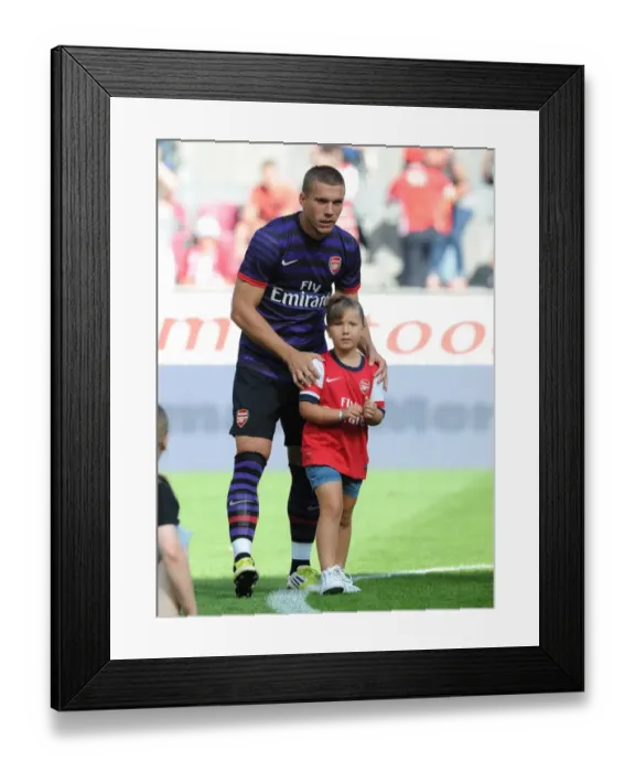 Framed Print : Lukas Podolski Pre-Season Training with Arsenal at Cologne, 2012