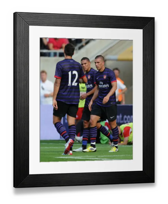 Framed Print : Lukas Podolski's Hat-Trick: Arsenal's Pre-Season Triumph Over FC Cologne (August 2012) Framed Print : Lukas Podolski's Hat-Trick: Arsenal's Pre-Season Triumph Over FC Cologne (August 2012)