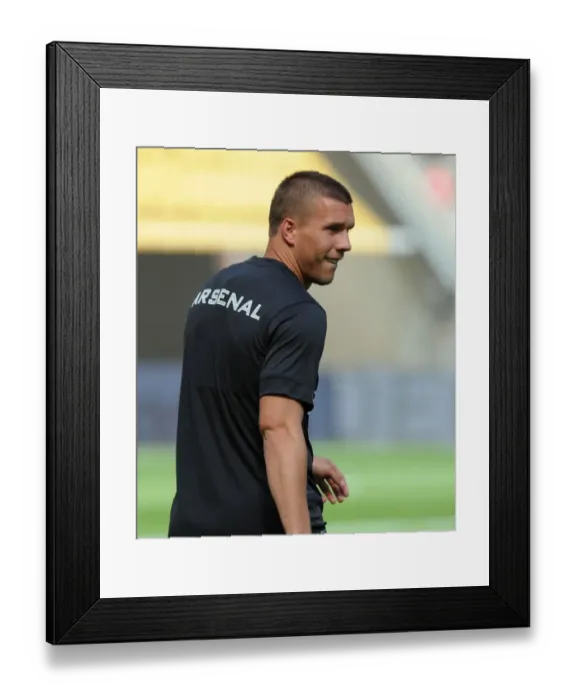 Framed Print : Lukas Podolski's Emotional Return: Arsenal Star Reunites with Cologne for Pre-Season Training Framed Print : Lukas Podolski's Emotional Return: Arsenal Star Reunites with Cologne for Pre-Season Training