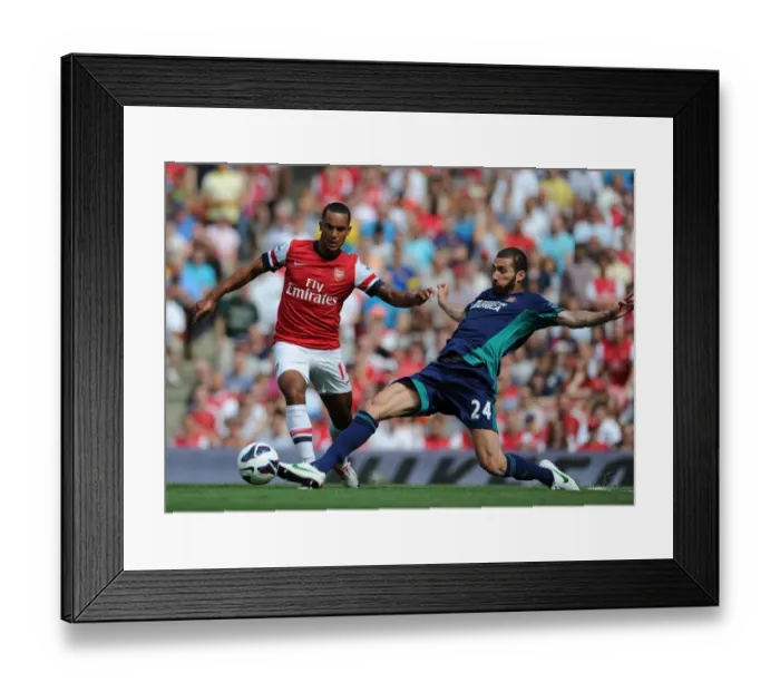 Framed Print : Theo Walcott vs Carlos Cuellar: A Premier League Battle at the Emirates, 2012-13 Framed Print : Theo Walcott vs Carlos Cuellar: A Premier League Battle at the Emirates, 2012-13
