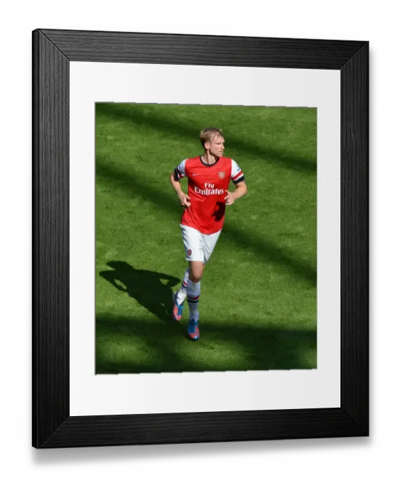 Framed Print : LONDON, ENGLAND - AUGUST 18: Arsenals Per Martesacker during the Barclays Premier League match between Arsenal and Sunderland at Emirates Stadium on August 18, 2012 in London, England. : Arsenal Football