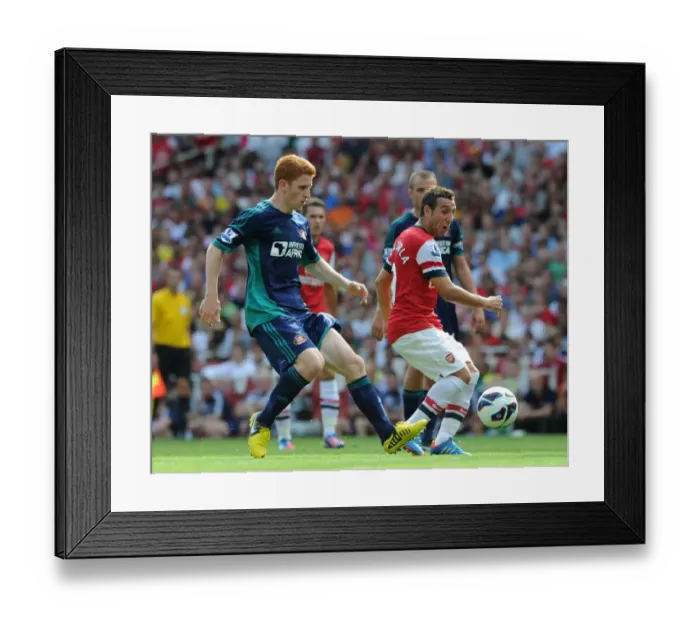 Framed Print : Santi Cazorla vs Jack Colback: Intense Battle in Arsenal v Sunderland Premier League Clash Framed Print : Santi Cazorla vs Jack Colback: Intense Battle in Arsenal v Sunderland Premier League Clash
