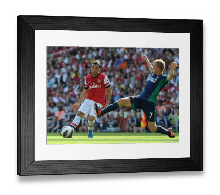 Framed Print : Santi Cazorla vs Seb Larsson: Intense Battle for Ball Possession at Arsenal vs Sunderland (2012-13) Framed Print : Santi Cazorla vs Seb Larsson: Intense Battle for Ball Possession at Arsenal vs Sunderland (2012-13)
