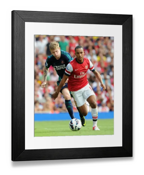 Framed Print : Theo Walcott Outpaces James McClean in Arsenal's Victory over Sunderland (2012-13) Framed Print : Theo Walcott Outpaces James McClean in Arsenal's Victory over Sunderland (2012-13)
