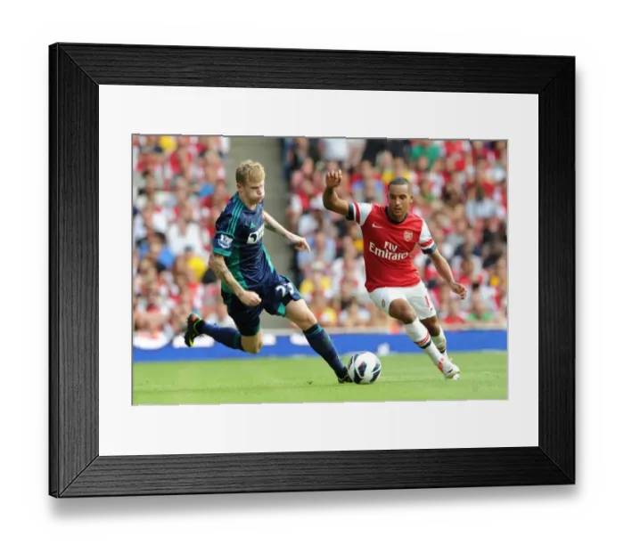 Framed Print : Theo Walcott Outpaces Rival James McClean: Arsenal's Winning Moment vs. Sunderland (2012-13) Framed Print : Theo Walcott Outpaces Rival James McClean: Arsenal's Winning Moment vs. Sunderland (2012-13)