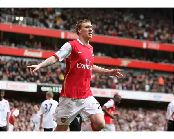 Nicklas Bendtner celebrates scoring the Arsenal goal