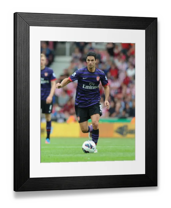 Framed Print : Mikel Arteta Leads Arsenal Against Stoke City in Premier League Clash (2012-13)