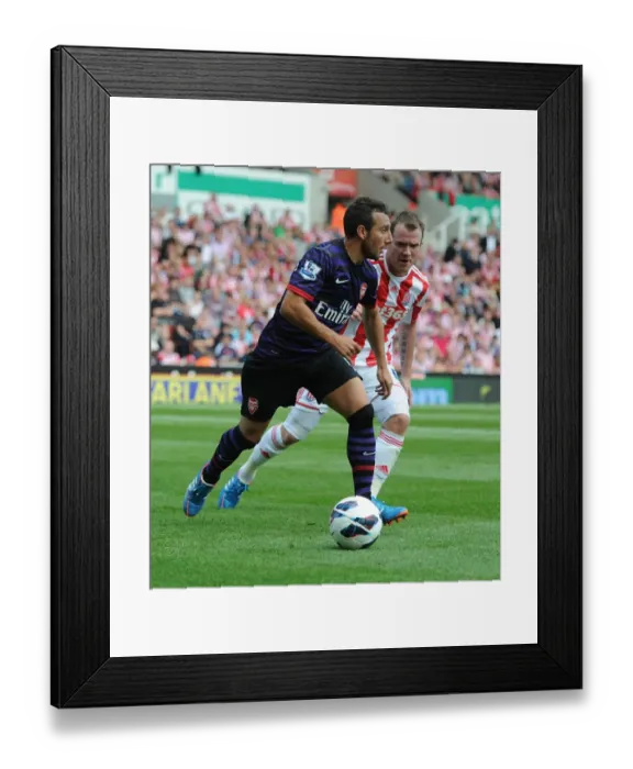 Framed Print : Santi Cazorla's Agile Outmaneuver of Glenn Whelan: A Iconic Moment from Arsenal's Victory over Stoke City (2012-13) Framed Print : Santi Cazorla's Agile Outmaneuver of Glenn Whelan: A Iconic Moment from Arsenal's Victory over Stoke City (2012-13)