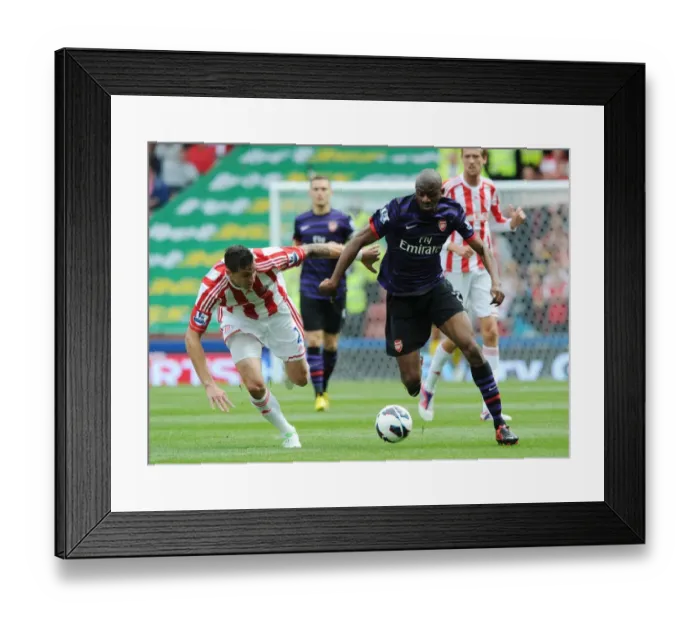 Framed Print : Abou Diaby vs. Geoff Cameron: A Battle at Britannia Stadium - Stoke City vs. Arsenal (2012-13)
