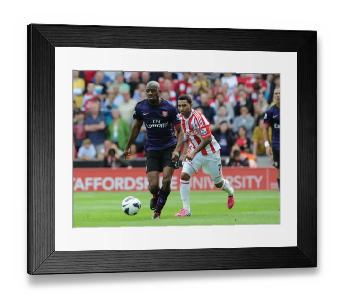 Framed Print : Abou Diaby Outmaneuvers Jermaine Pennant: A Premier League Battle at Britannia Stadium, 2012-13 Framed Print : Abou Diaby Outmaneuvers Jermaine Pennant: A Premier League Battle at Britannia Stadium, 2012-13
