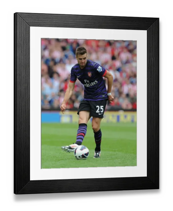 Framed Print : Arsenal's Carl Jenkinson Faces Off Against Stoke City in 2012-13 Premier League Clash Framed Print : Arsenal's Carl Jenkinson Faces Off Against Stoke City in 2012-13 Premier League Clash