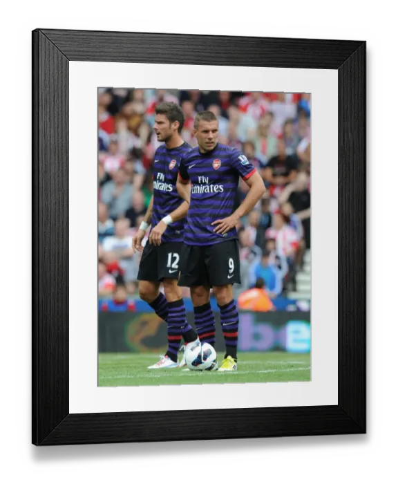 Framed Print : Arsenal Forwards Olivier Giroud and Lukas Podolski in Action at Stoke City (2012-13) Framed Print : Arsenal Forwards Olivier Giroud and Lukas Podolski in Action at Stoke City (2012-13)