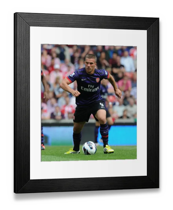 Framed Print : Podolski in Action: Arsenal vs. Stoke City, Premier League 2012-13