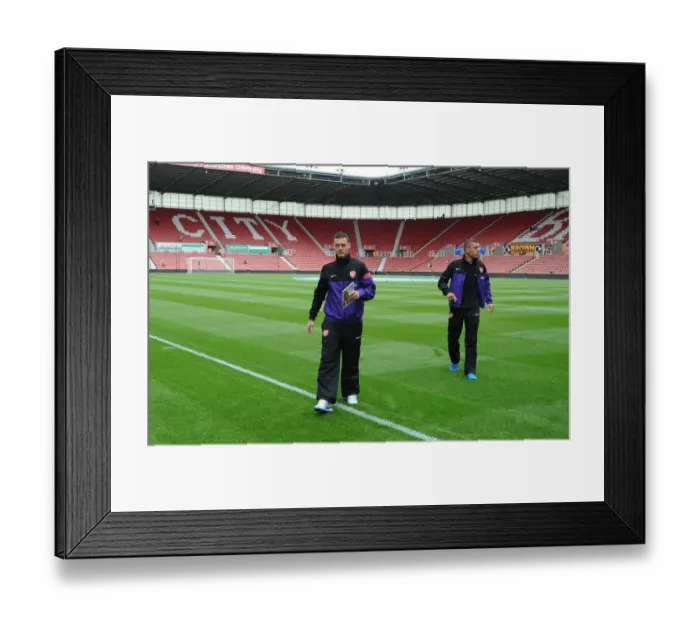 Framed Print : Arsenal Duo Thomas Vermaelen and Lukas Podolski Before Stoke City Clash (2012-13)