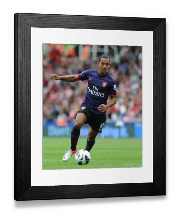 Framed Print : Theo Walcott in Action: Arsenal vs Stoke City, Premier League 2012-13 Framed Print : Theo Walcott in Action: Arsenal vs Stoke City, Premier League 2012-13