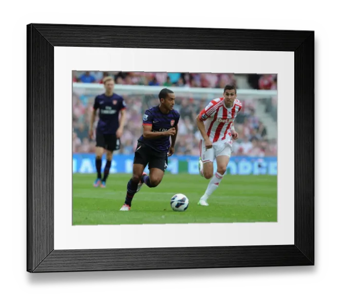 Framed Print : Theo Walcott Outmaneuvers Geoff Cameron: A Pivotal Moment from Stoke City vs. Arsenal (2012-13)